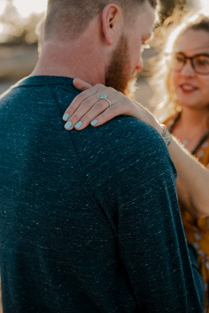 engaged couple wedding ring