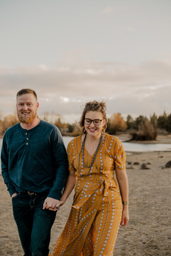 engaged couple walking