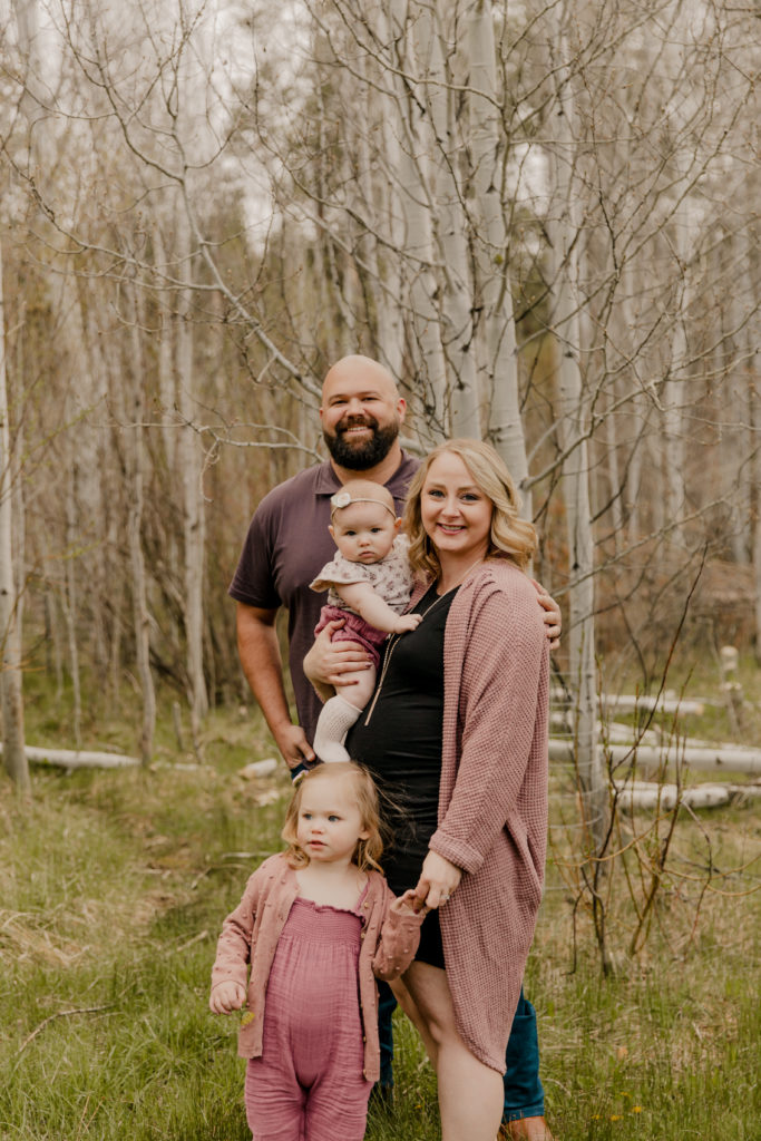 family photography session at shevlin park in bend oregon, standing together and smiling 